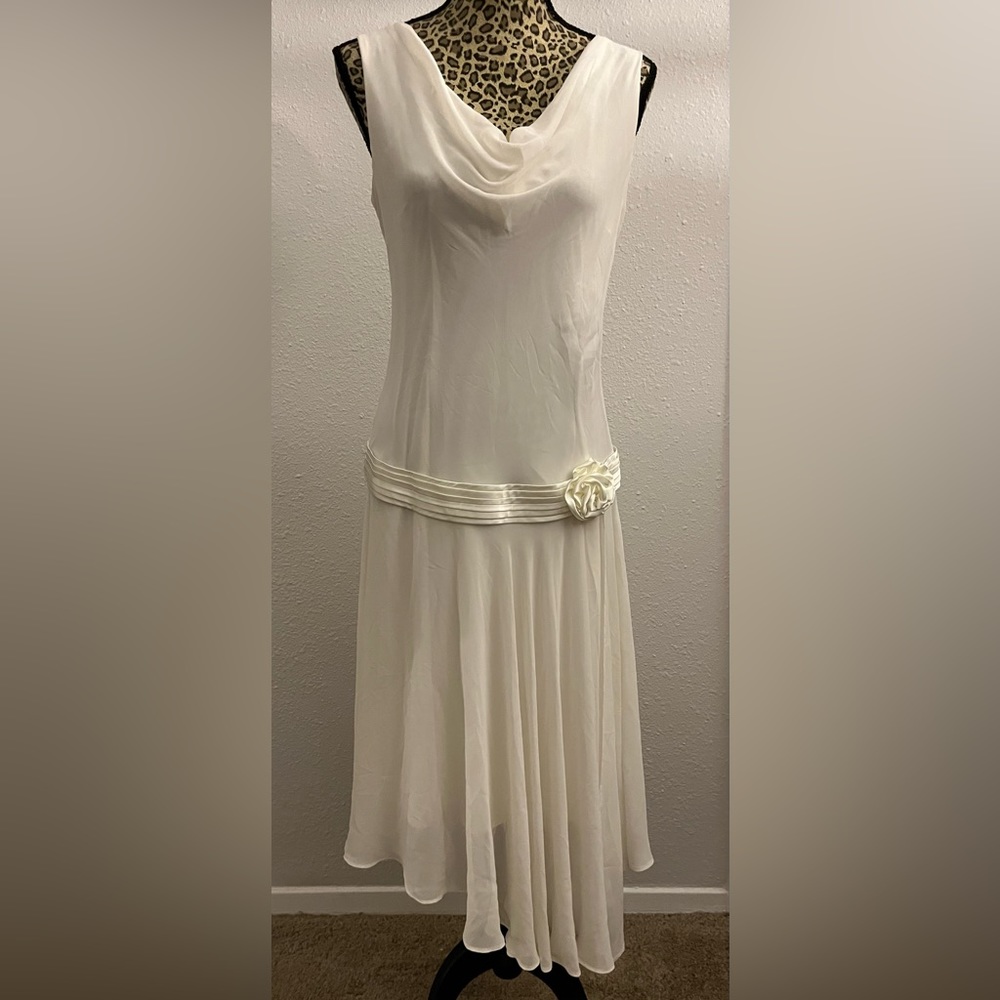 Beautiful Soft Flowing chiffon hip accented party dress.